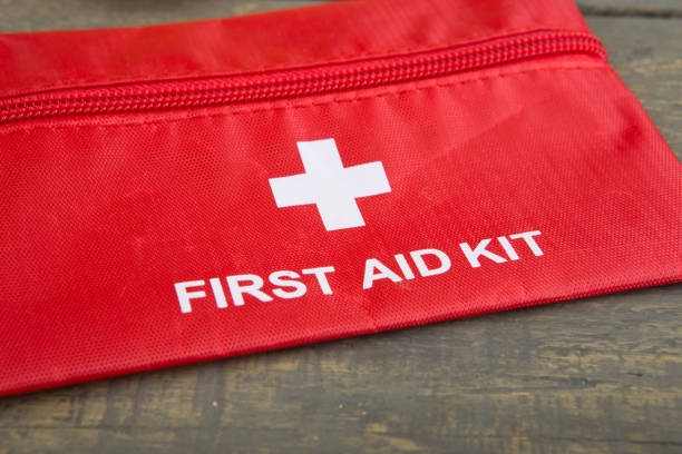 istock First aid medical kit on wood background,copy space,top view 1241450394