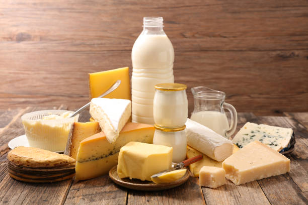 assortimento di latticini con latte, burro, formaggio - dairy product foto e immagini stock