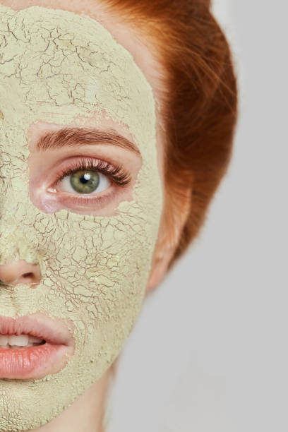 istock good looking ginger woman with mask looking at the camera 1241490600