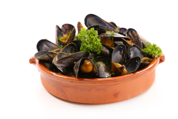 mussel with parsley isolated on white background