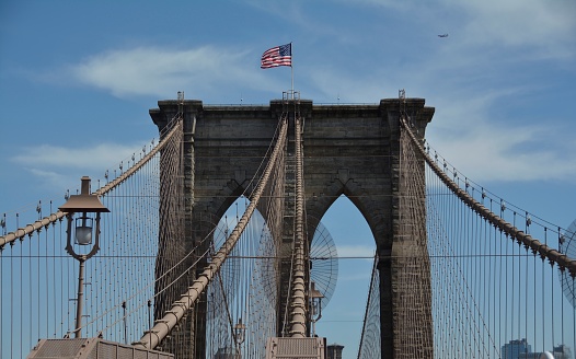 Flag captaining the brooklyn bridge