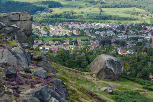 Cow and Calf Rocks on Ilkley moor in Wharfedale West Yorkshire England.The Cow and Calf Rock is situated above the town of Ilkley and holds the legend of Rombald The Giant.
