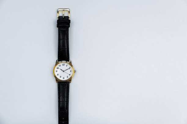 istock Retro wristwatch with Roman numerals isolated on white background 1241519614