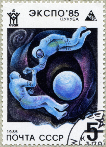 stamp printed in USSR, shows Cosmonauts in space, Tsukuba, Japan, circa 1985