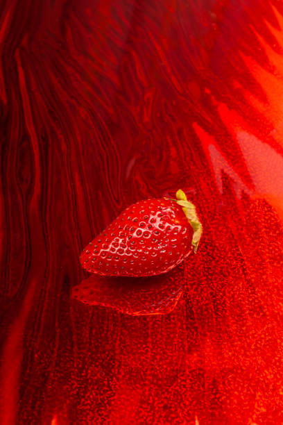 One fresh tasty strawberries on a art wavy background