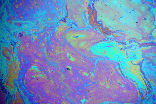 istock colorful rainbow oil slick background 1241563916