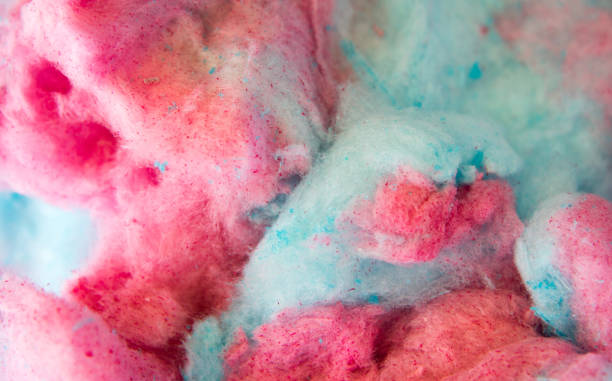 Cotton Candy Background Full frame background of fluffy pink and blue cotton candy candyfloss stock pictures, royalty-free photos & images