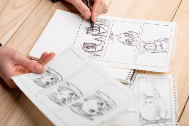 istock Artist drawing an anime comic book in a studio. 1241564981