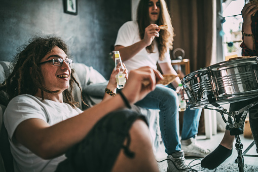 teens make fun at home and playing music