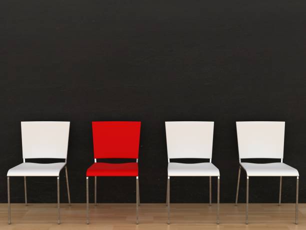 istock Different chairs unemployment job search 1241598990