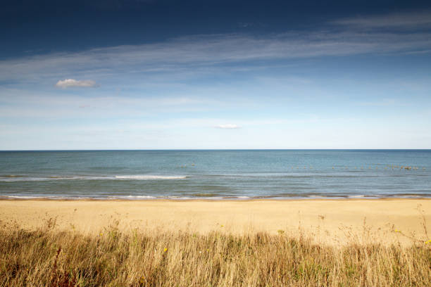 seascape image of the beach seas and a cloudly sky