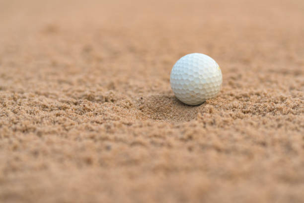 istock Golfer hit Golf ball on sand trap bunker at golf courses 1241617535