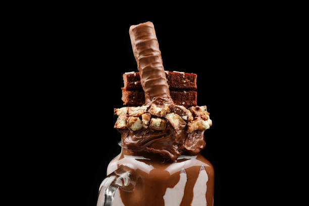 istock Chocolate extreme milkshake with brownie cake, chocolate paste and sweets. Crazy freakshake food trend. Copy space 1241618664