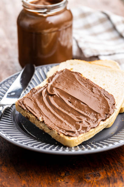 istock Toast bread with hazelnut spread. Sweet chocolate cream. 1241628011