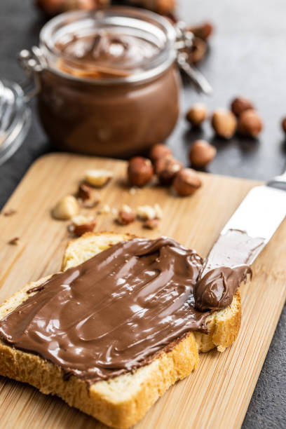istock Toast bread with hazelnut spread. Sweet chocolate cream. 1241629658