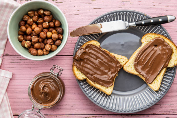 Toast bread with hazelnut spread. Sweet chocolate cream.