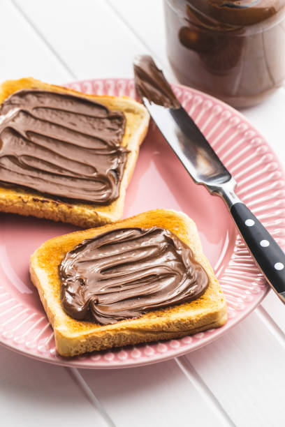 istock Toast bread with hazelnut spread. Sweet chocolate cream. 1241633038