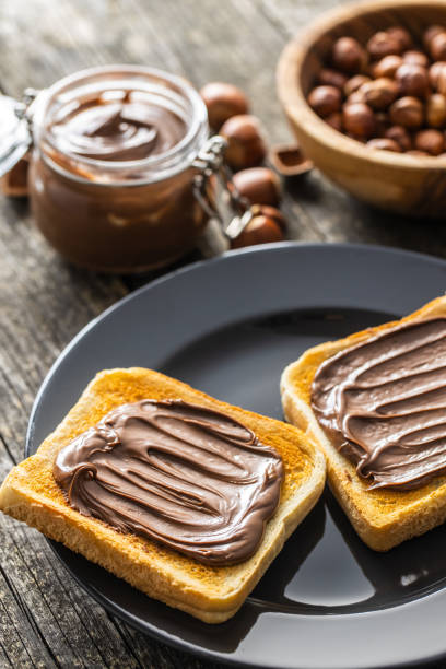 istock Toast bread with hazelnut spread. Sweet chocolate cream. 1241633593