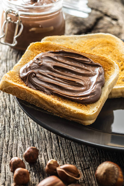 istock Toast bread with hazelnut spread. Sweet chocolate cream. 1241634122