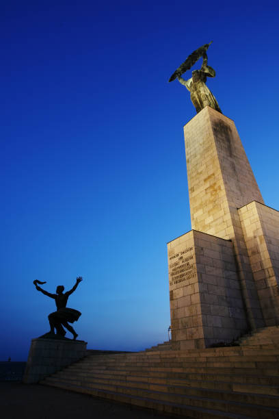 istock The Liberty Monument (sometimes Freedom Monument) in Budapest at night 1241639965