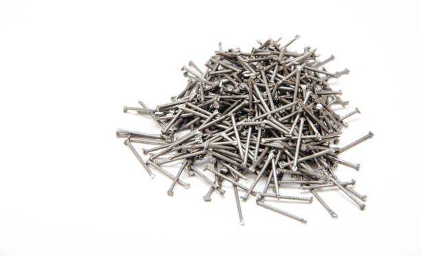 istock Nail. A pile of nails on a white background in macro. for text. 1241645253