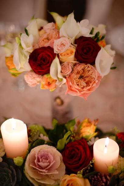 istock candles and flowers on wedding table 1241655396
