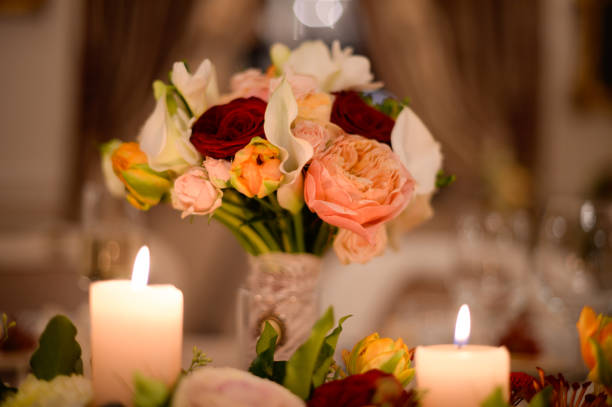istock candles and flowers on wedding table 1241655441