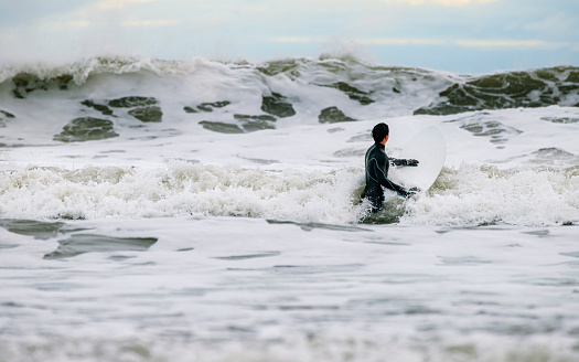 Katsuura, Chiba / Japan - June 10th, 2019: Japanese surfers, enjoying the fantastic surfing conditions & perfect blue ocean at the famous beach of Hebara in Chiba. Near to the surf competition venue