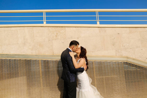 istock Groom and bride kissing 1241719826