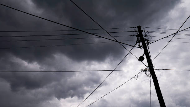 istock Electric pole against the stormy sky. 1241721496