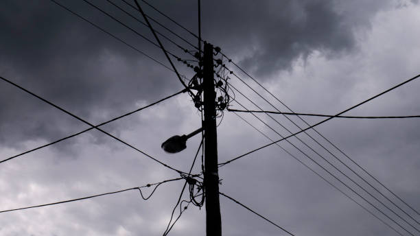 istock Electric pole with lightning rod against the stormy sky 1241722028