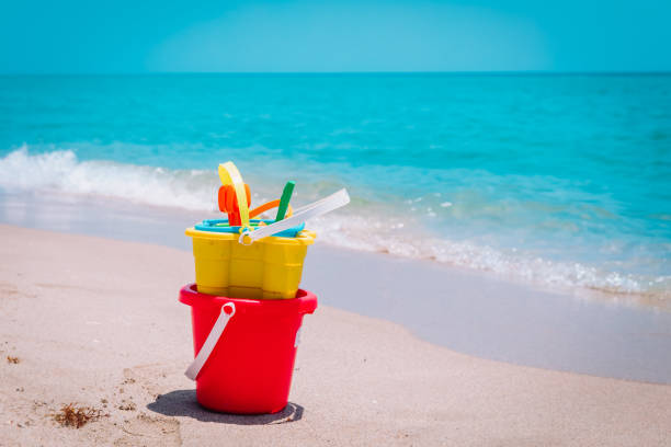 istock kid toys on tropical sand beach 1241727571