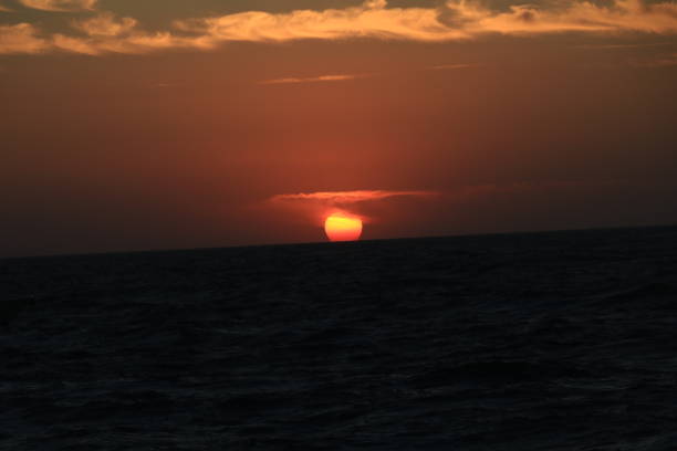istock Beautiful sunset in Santorini island, Greece 1241740773