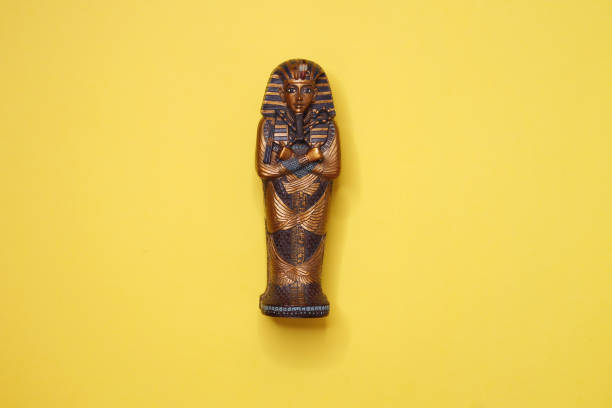 Ancient Egyptian Pharaon Tutankhamun's Sarcophagus and yellow background