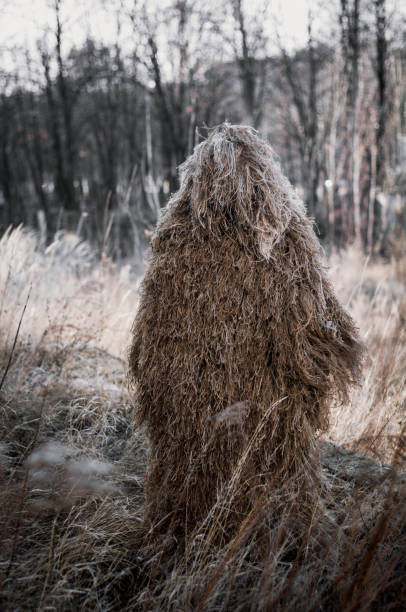 istock camouflage ghillie suit for snipers and intelligence agents. 1241742415