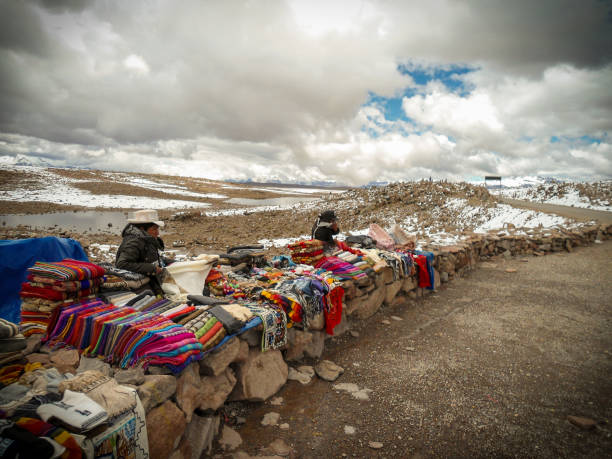 Woman selling souvenir in the mirador de los volcanes in Peru