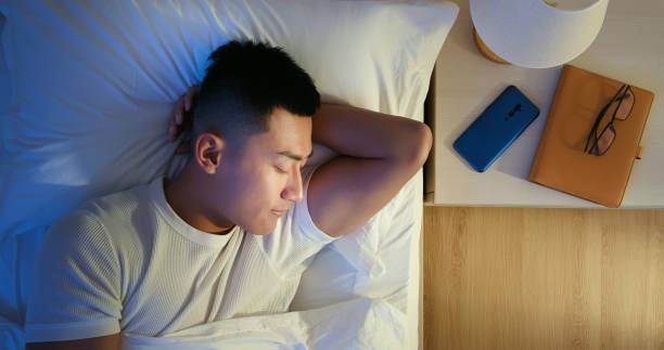 istock asian man sleep well 1241760832