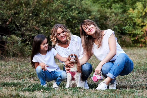 istock Family walk with dog 1241767601