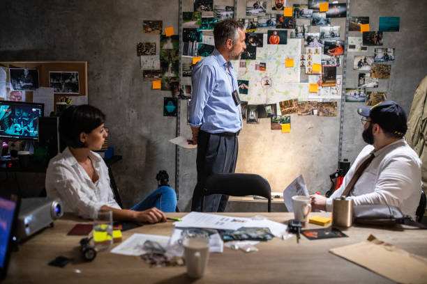 istock FBI team working together at office late at night to solve the case 1241791696