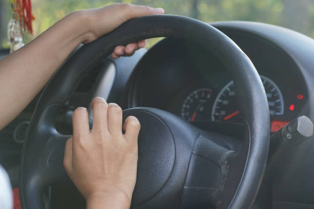 istock Human hands pressing the car horn 1241796302