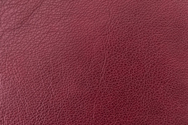 istock Texture of genuine leather, dark burgundy color, background, surface, pattern for backdrop. Manufacturing and leather industry concept 1241803422