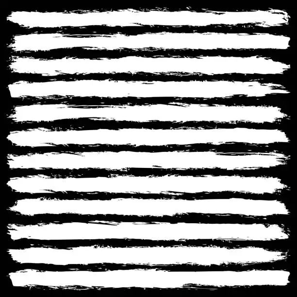 Vector illustration of Set of white brush strokes on black background