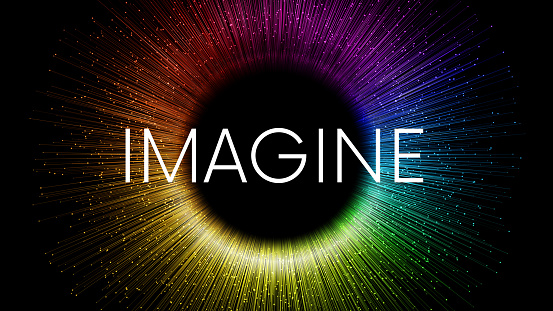 IMAGINE word written on black background with colorful rainbow streaks and glowing sparkling particles. Color explosion circle banner with place for your content