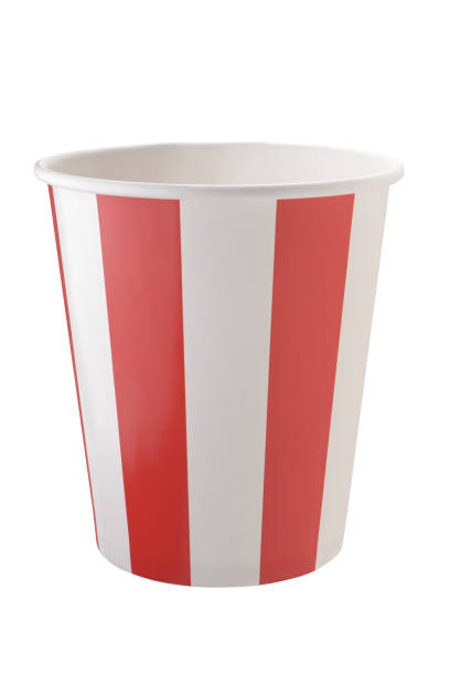 istock Disposable paper cup with vertical lines. Isolated on a white background. Carved with a pen tool. 1241880780