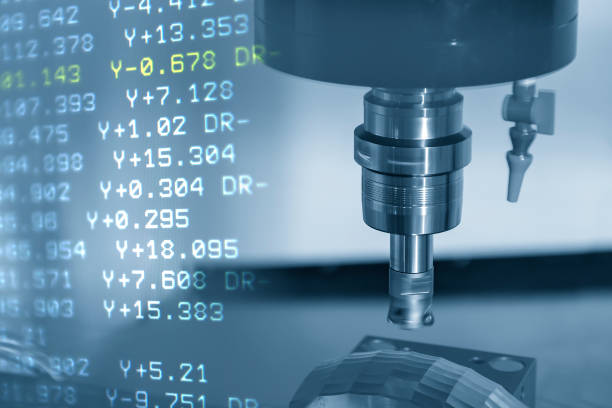 The abstract scene of CNC milling machine and the G-code data background. The mold and die manufacturing process by machining center .