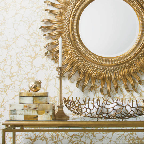 istock Golden luxury interiors with mirror and candles on a table. Bathroom mirror. 1241926230