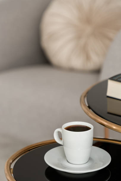 istock Cup of coffee on modern table 1241926239
