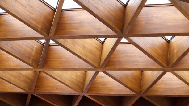 istock Luxurious geometric wooden triangles in construction. The concept of modern architecture, design and interior. Wood background. Modular canopy or roof 1241940832