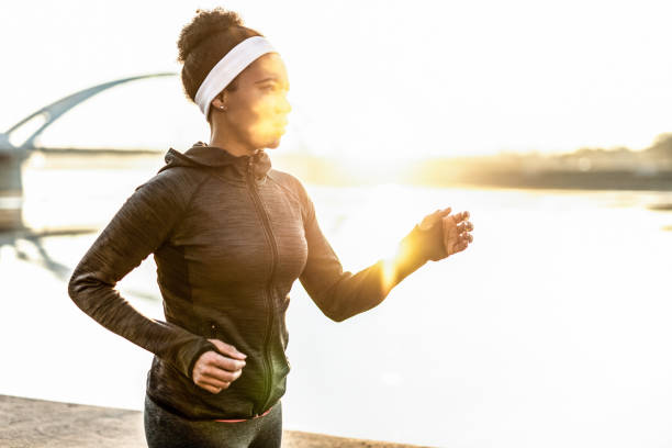 istock Athletic Woman Running on Cold Weather. 1241951366
