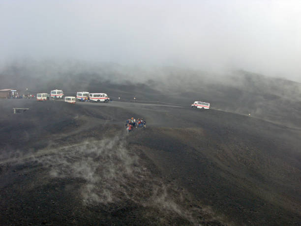 istock Buses with tourists on Mount Etna, active volcano 1241960020
